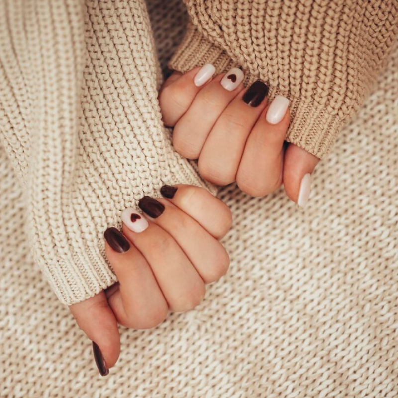 close-up-woman-hands-with-nail-art_1048944-24696261