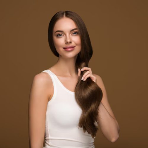 long-healthy-hair-woman-with-long-curly-hair-beauty-skin-face-portrait-color-background_431835-7157